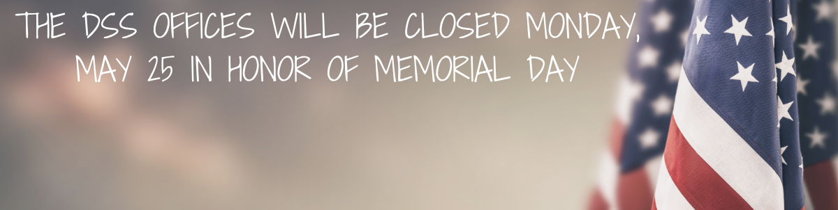Announcement graphic with the text ‘The DSS offices will be closed Monday, May 25 in honor of Memorial Day’ over a blurred background, featuring a close-up of an American flag on the right side.